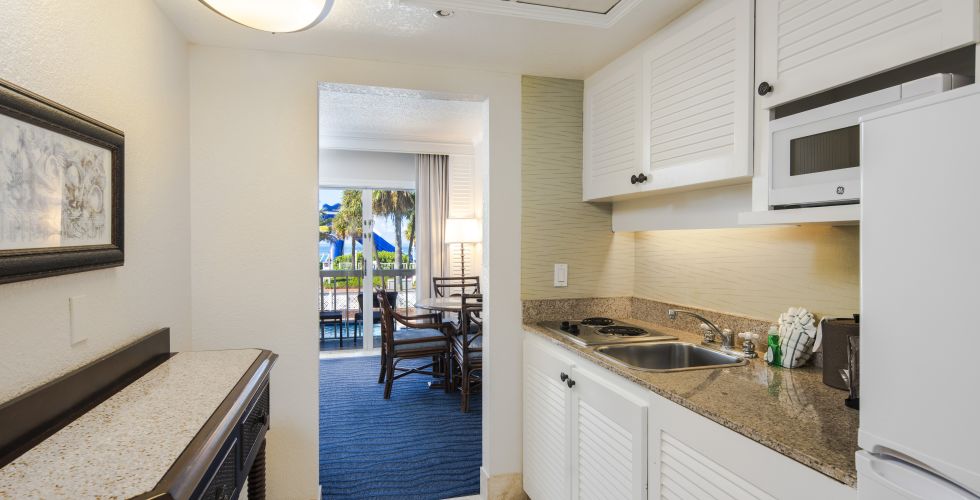 A Kitchen With White Cabinets