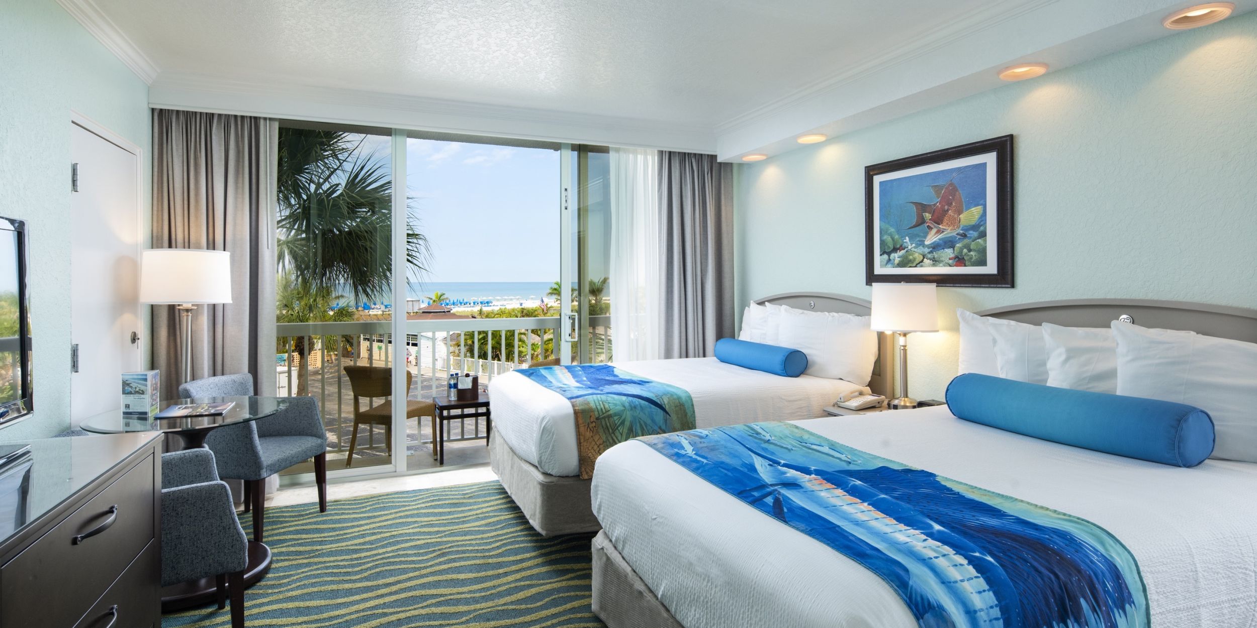 A Bedroom With A Large Bed In A Hotel Room