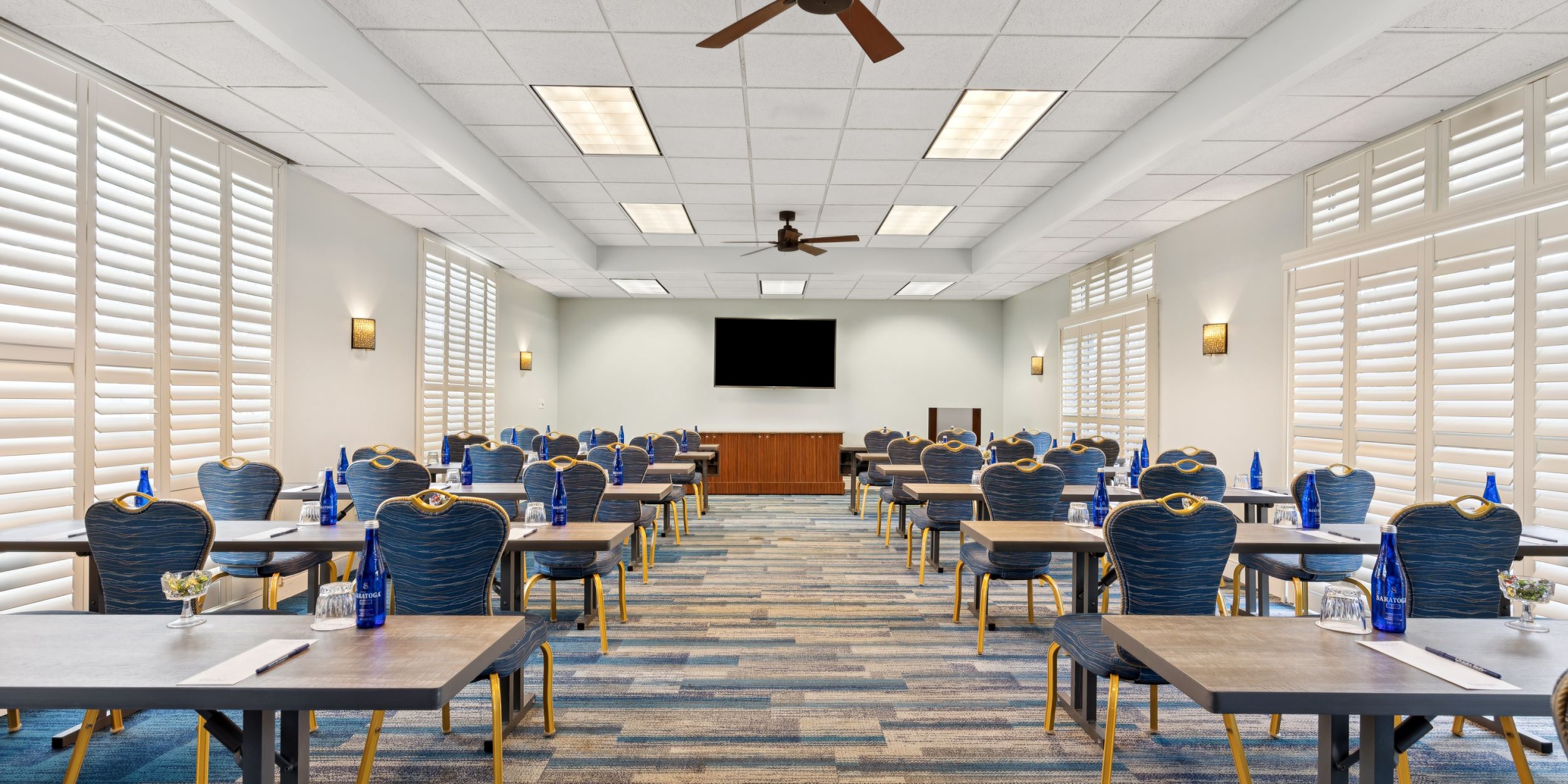 A Room With Tables And Chairs