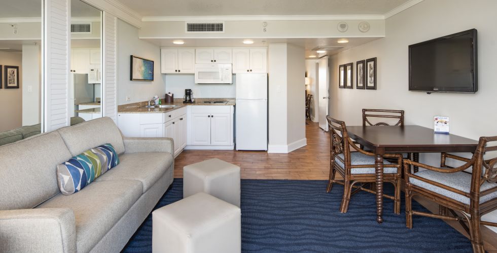 A Living Room With A Couch And A Tv