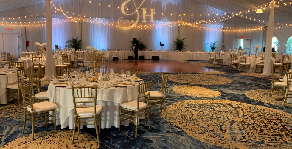 A Body Of Water With A City In The Background