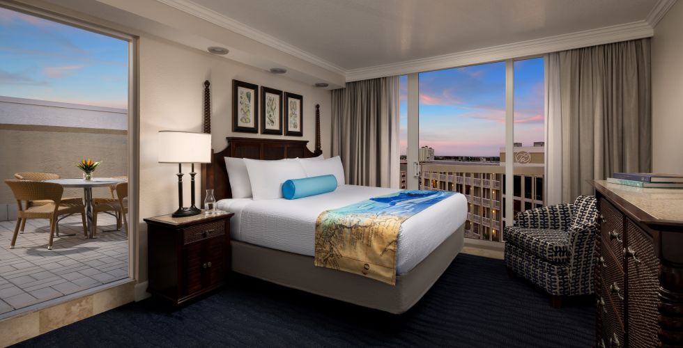 A Bedroom With A Large Window