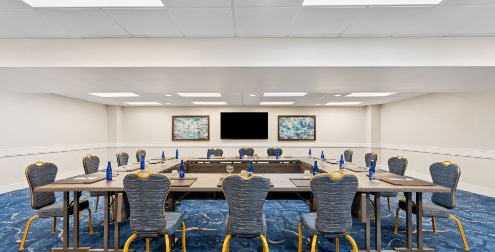 A Room With Tables And Chairs