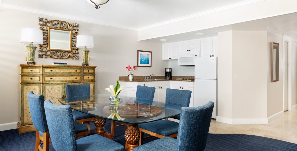 A Dining Room With Blue Chairs