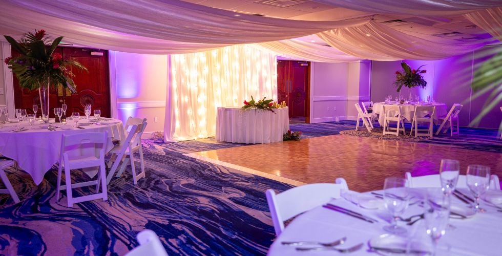 A Room With Tables And Chairs