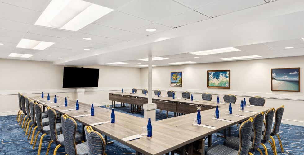 A Room With Tables And Chairs