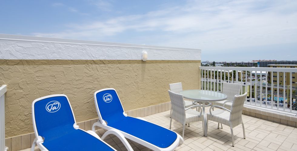 A Chair Sitting In Front Of A Beach