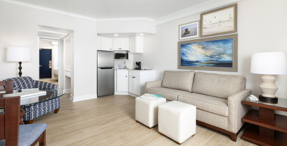 A Living Room With A Couch And A Table