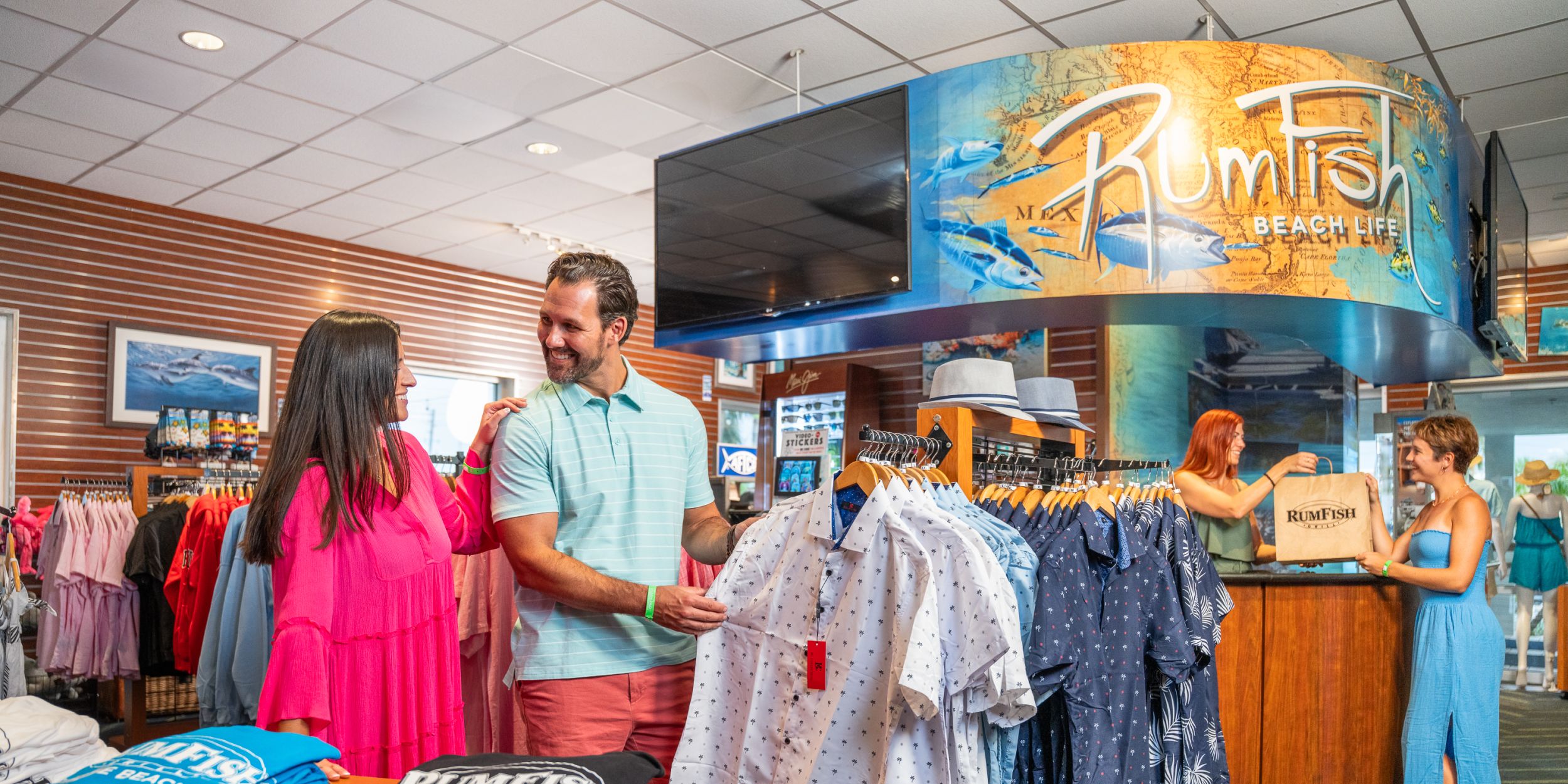 A Man And A Woman In A Clothing Store