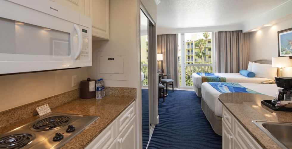 A Kitchen With A Sink And A Window