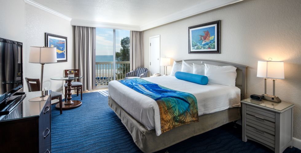 A Bedroom With A Large Bed