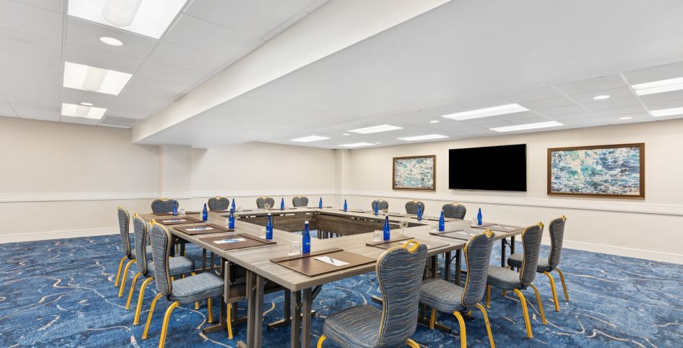 A Room With Tables And Chairs