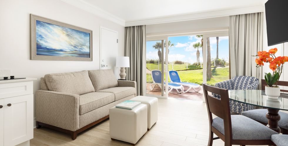 A Living Room With A Large Window