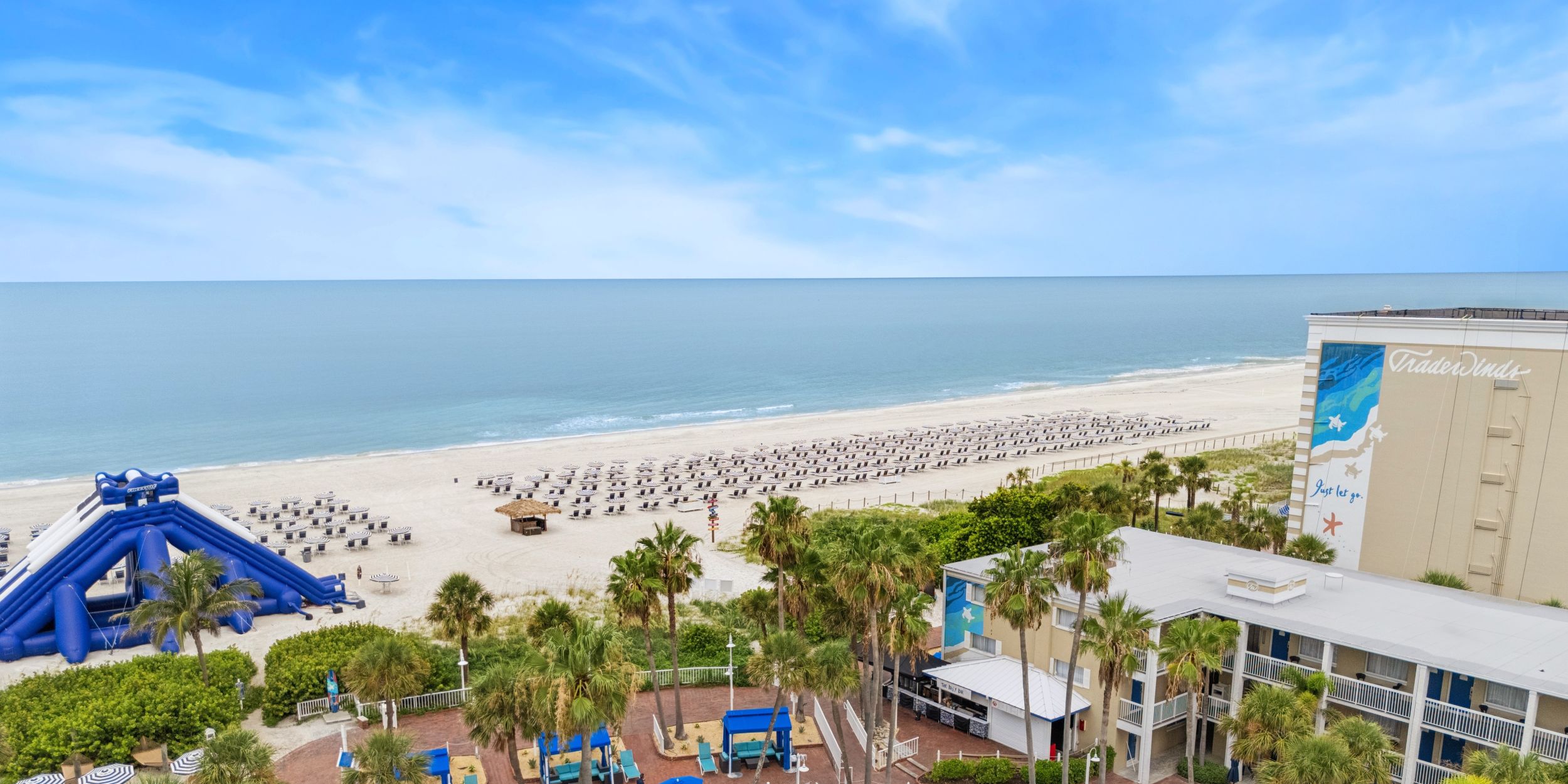 A Resort With A Beach And Ocean