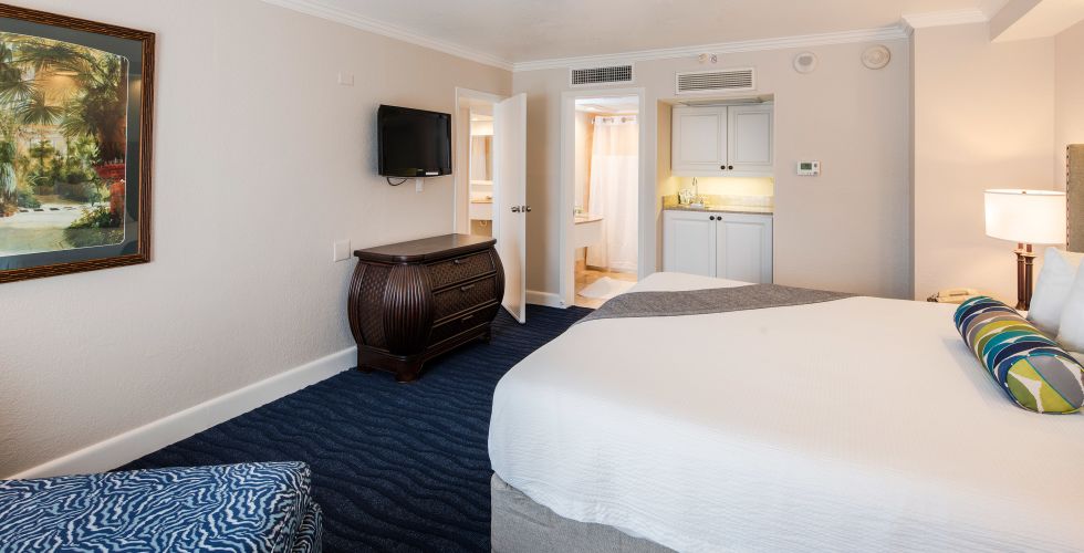 A Bedroom With A Bed In A Room