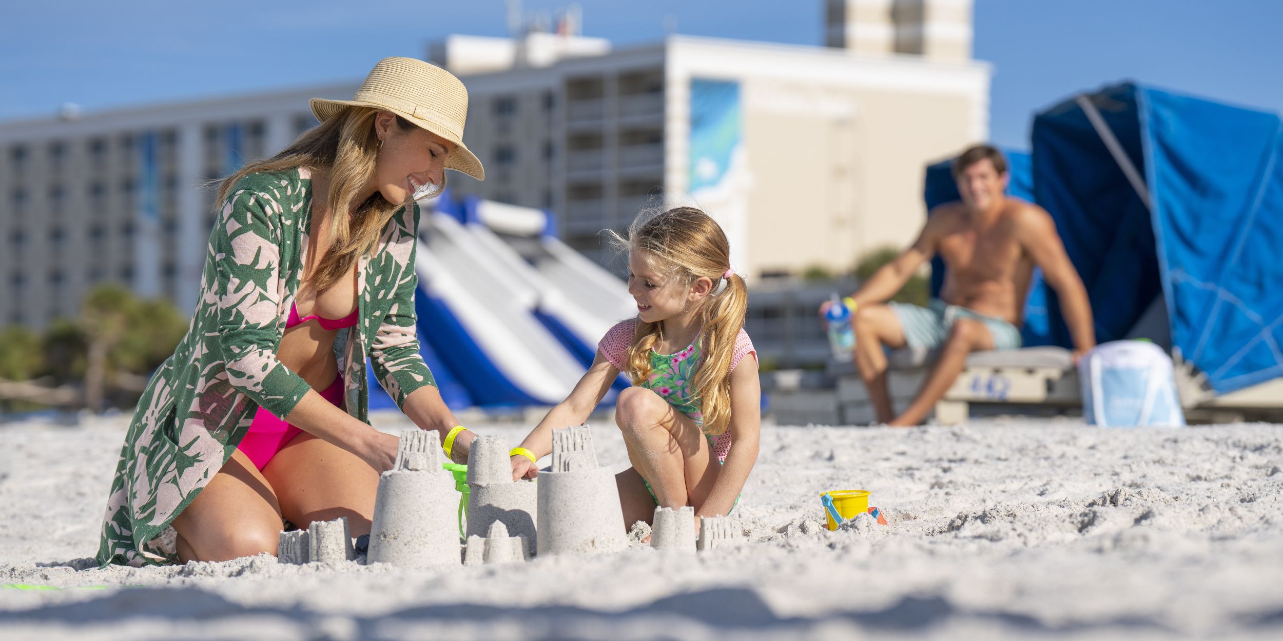 A Woman Sitting At A Beach