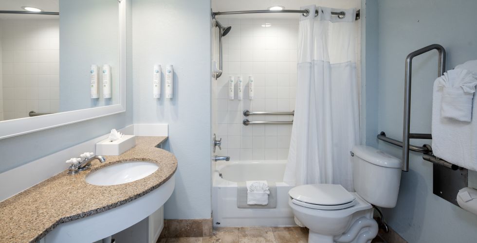 A Bathroom With A Sink Toilet And Bathtub
