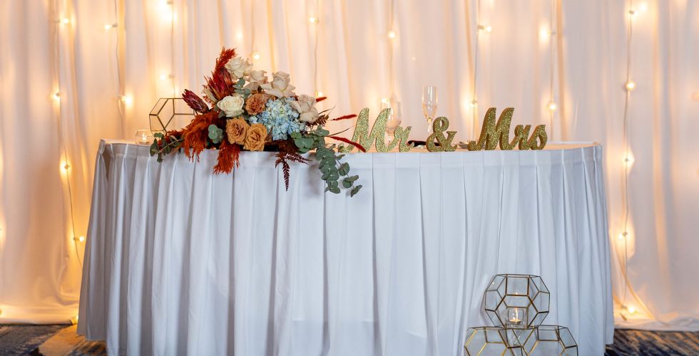A Table With Flowers On It
