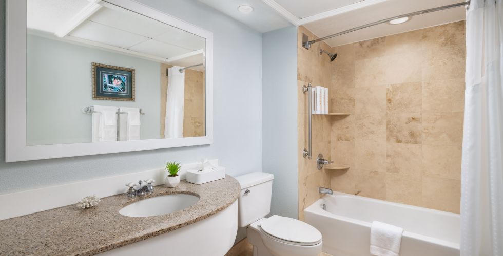 A Bathroom With A Tub Sink And Toilet