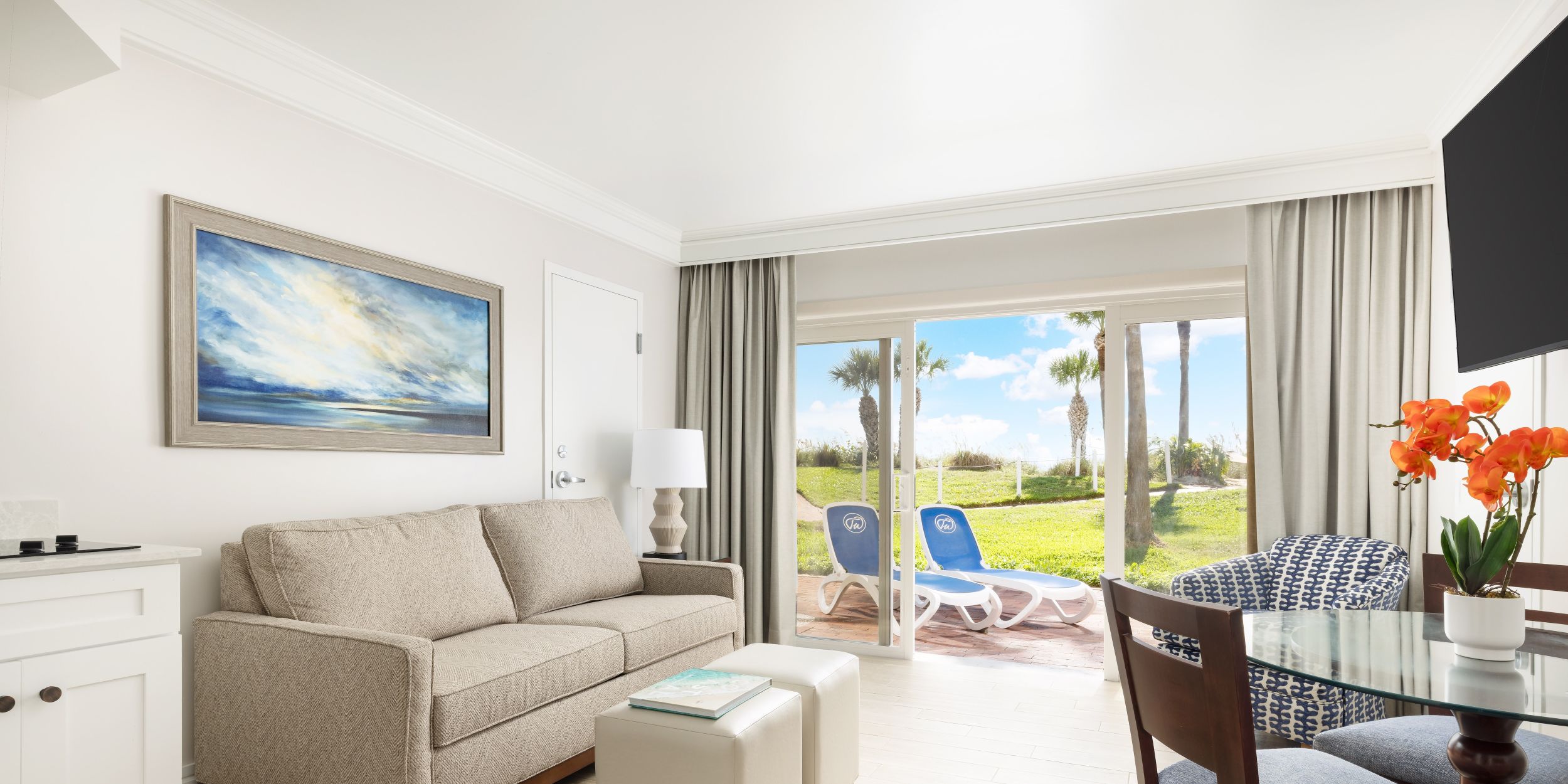 A Living Room With A Large Window