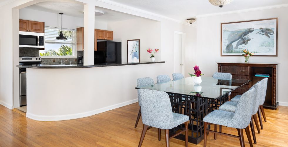 A Dining Room With A Table And Chairs