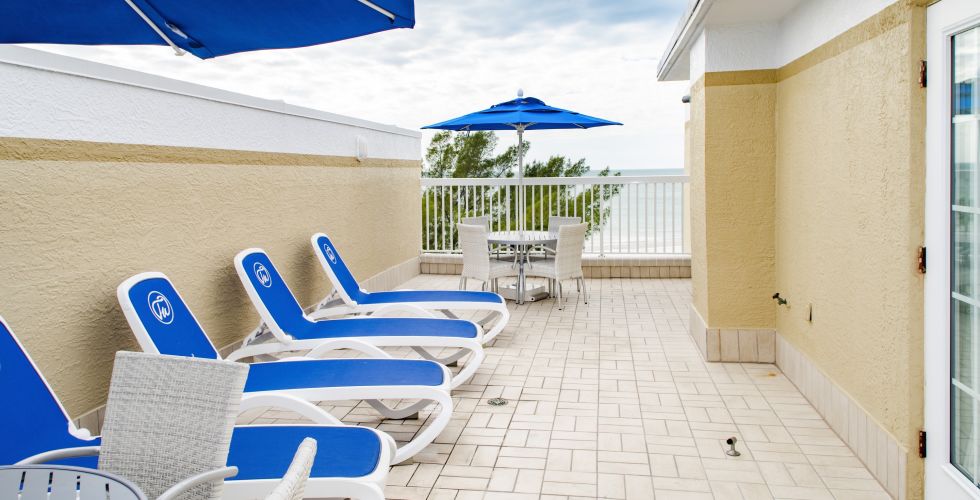 A Building With A Blue Umbrella