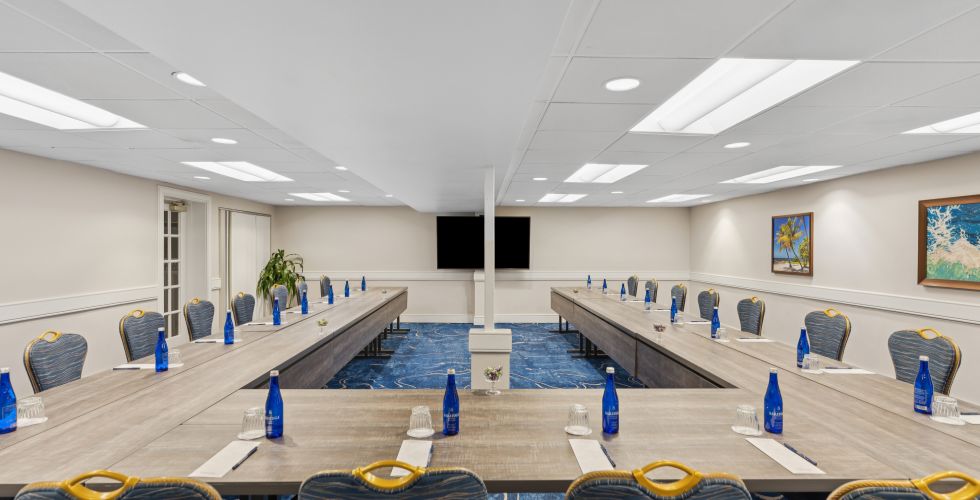 A Room With Chairs And Tables