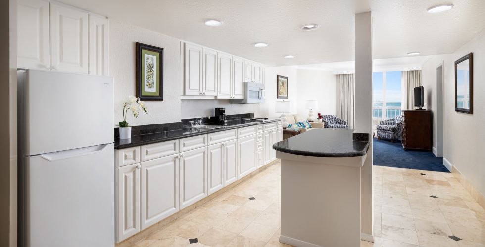 A Kitchen With White Cabinets