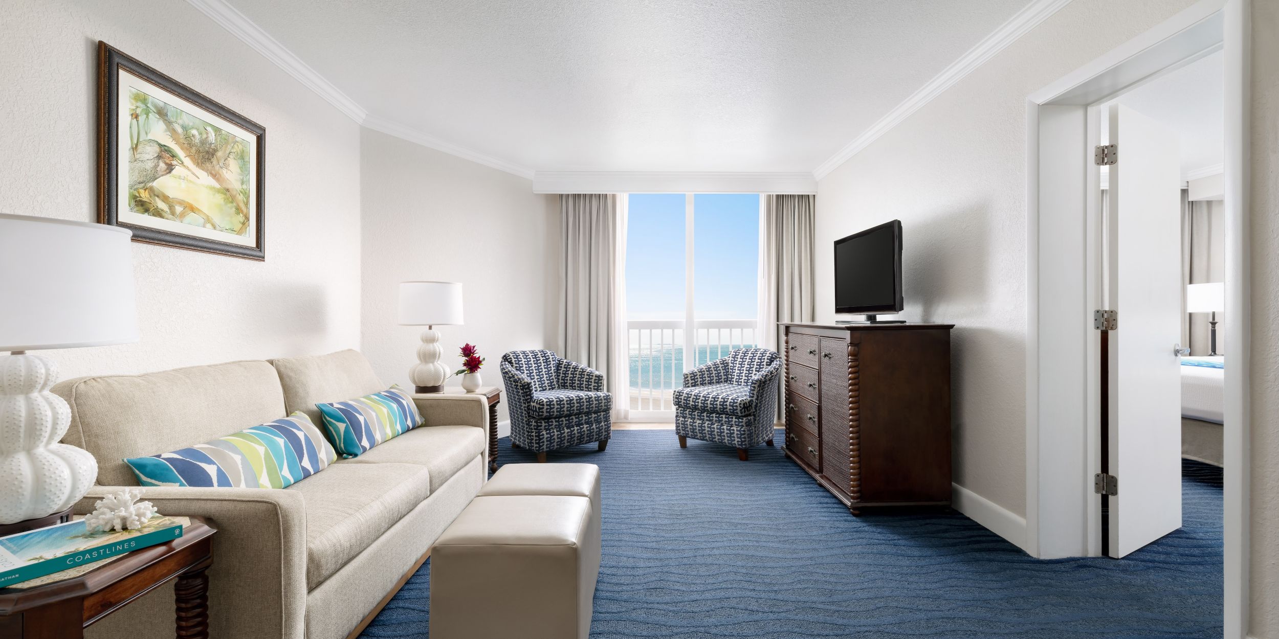 A Living Room With A Blue Carpet