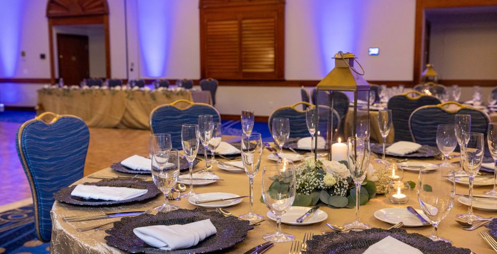 A Table With Plates And Glasses On It