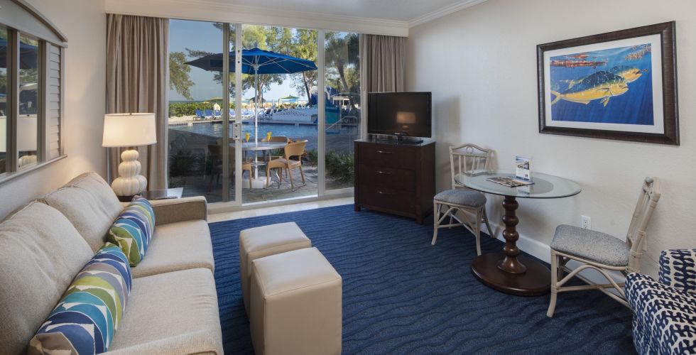 A Living Room Filled With Furniture And A Fireplace